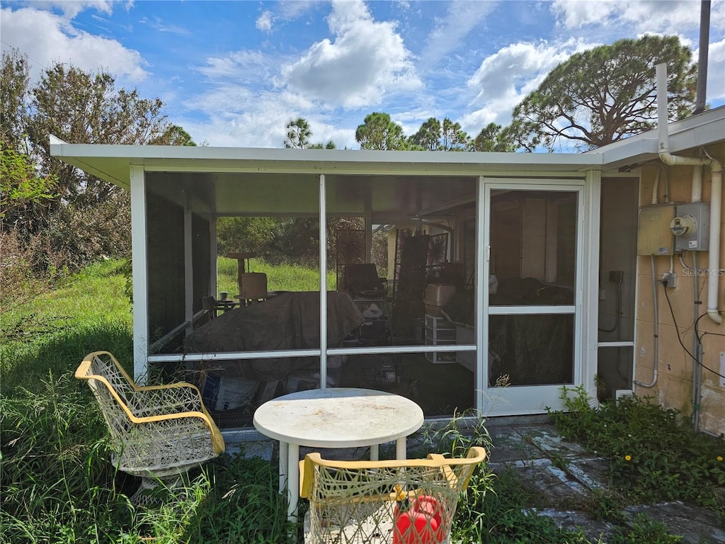 exterior space with a sunroom