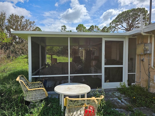 exterior space with a sunroom