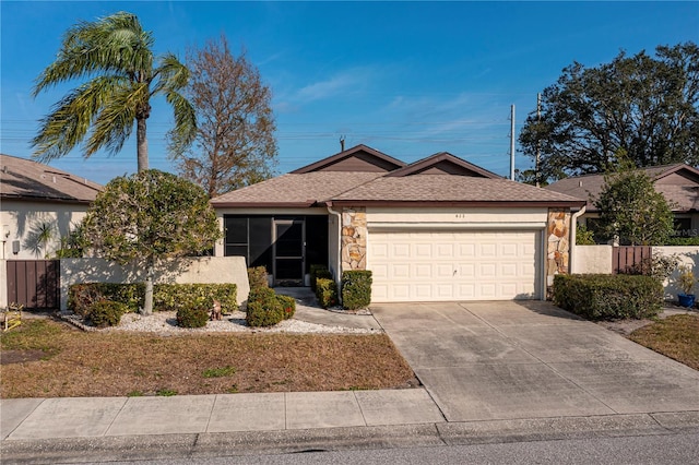 single story home with a garage