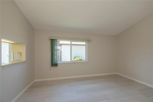 unfurnished room featuring light wood-type flooring