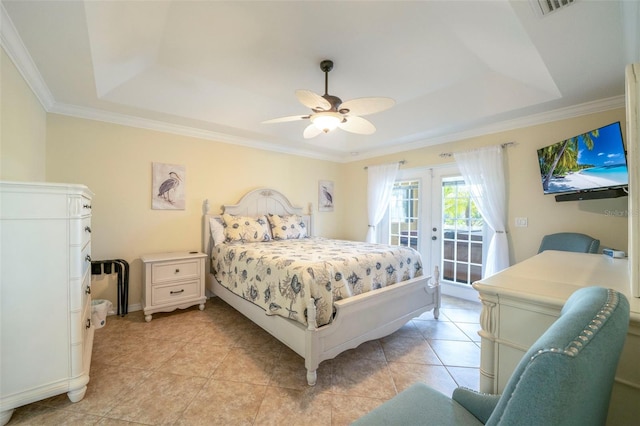 tiled bedroom with access to outside, a tray ceiling, ceiling fan, and crown molding