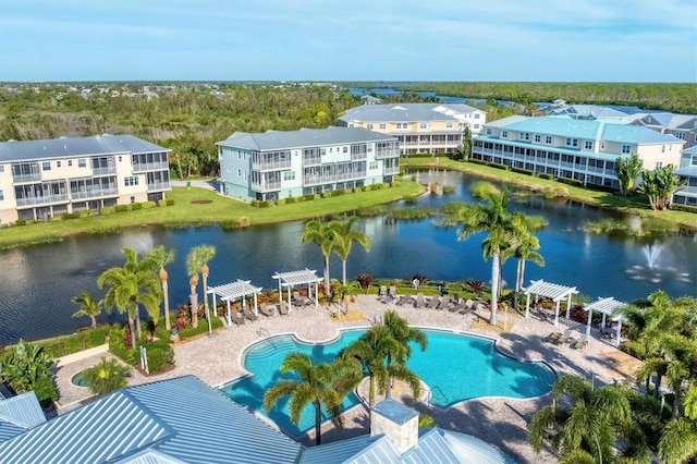 drone / aerial view with a water view