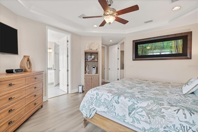 bedroom with ornamental molding, ensuite bathroom, light wood-type flooring, and ceiling fan