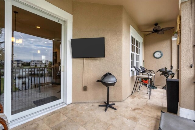 view of patio / terrace with ceiling fan