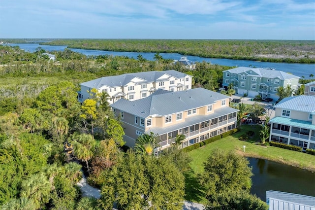 bird's eye view with a water view