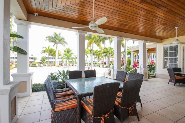 view of patio featuring ceiling fan