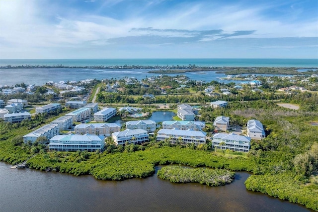 drone / aerial view with a water view