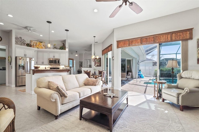 tiled living room featuring ceiling fan