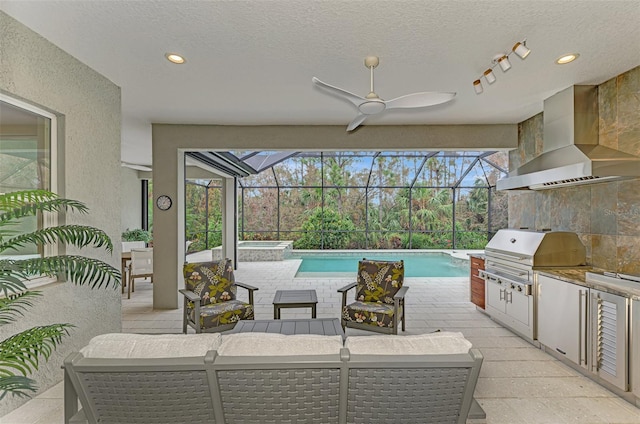 view of patio / terrace with a grill, an outdoor kitchen, an outdoor living space, a ceiling fan, and a pool with connected hot tub