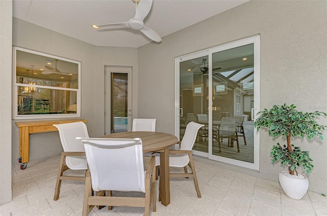 dining space with ceiling fan