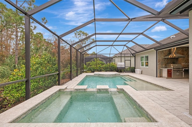 view of swimming pool with glass enclosure, area for grilling, and an in ground hot tub