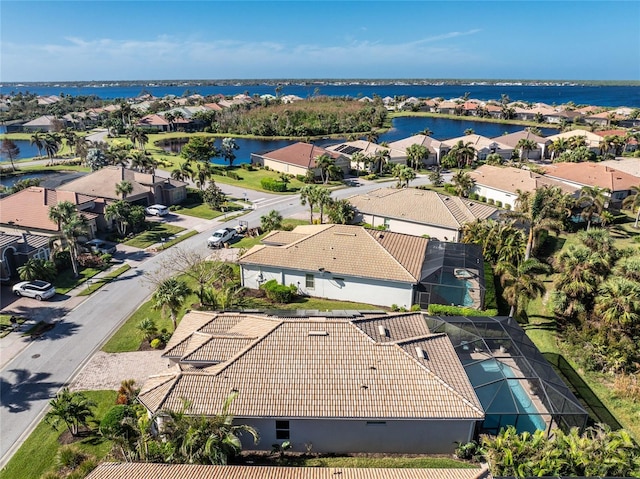 drone / aerial view featuring a water view