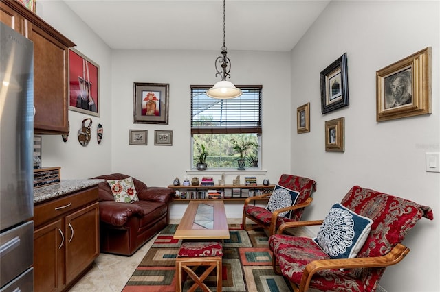 sitting room featuring light tile patterned flooring