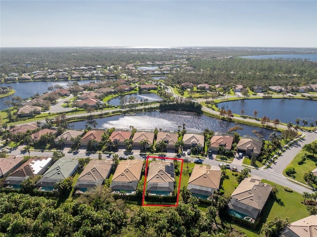 bird's eye view with a water view