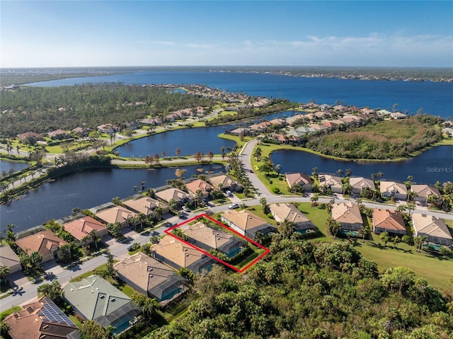 bird's eye view with a water view