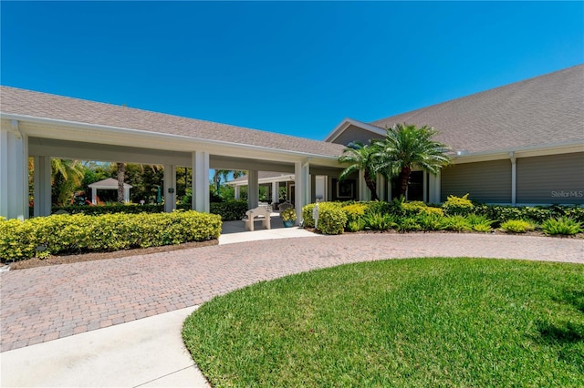 view of front of home with a front yard