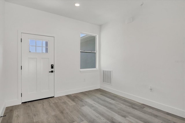 entrance foyer with light hardwood / wood-style floors