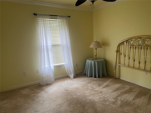 empty room with light colored carpet, plenty of natural light, and ornamental molding