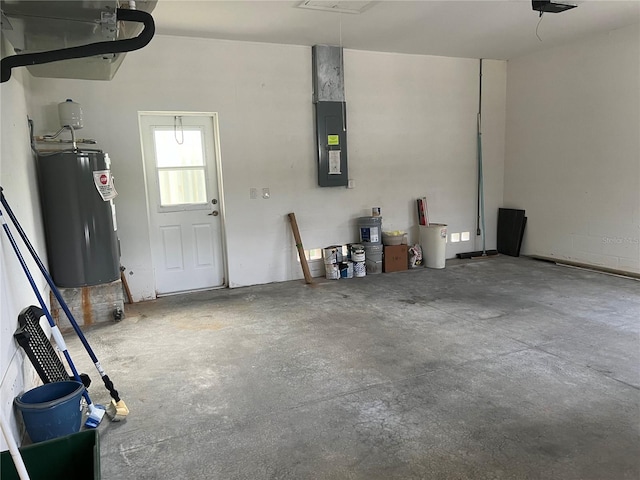 garage with electric panel and water heater