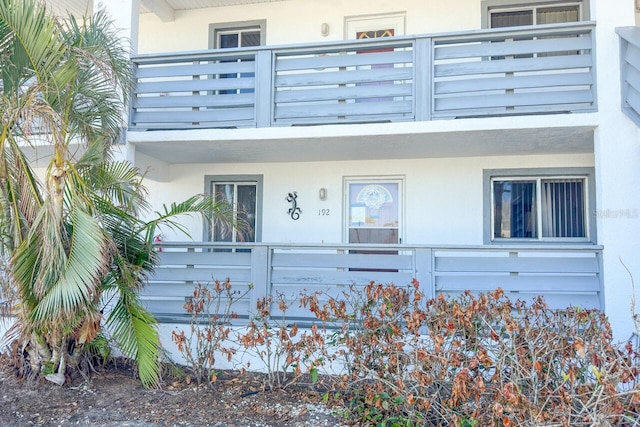 property entrance with a balcony