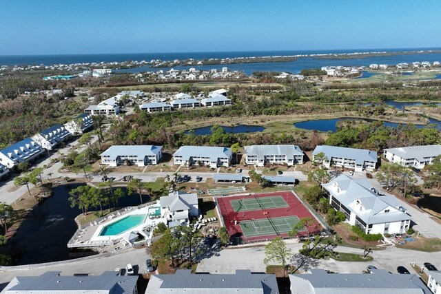 bird's eye view with a water view