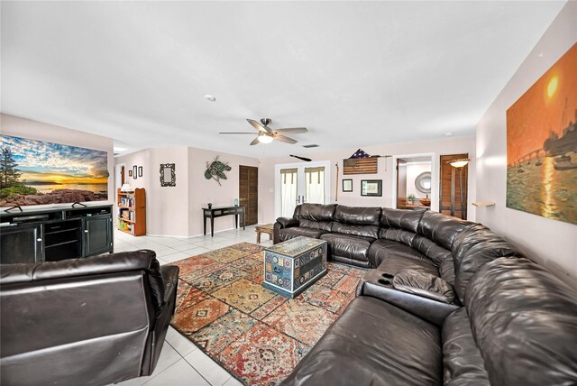 tiled living room featuring ceiling fan