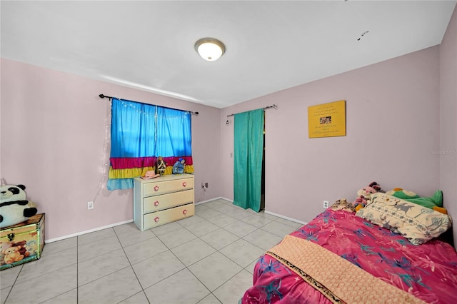 bedroom featuring tile patterned flooring