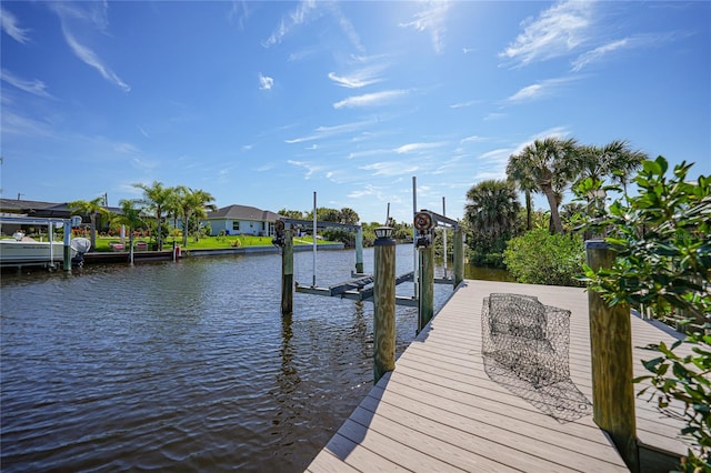 dock area featuring a water view