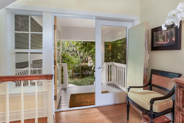 doorway to outside with hardwood / wood-style flooring