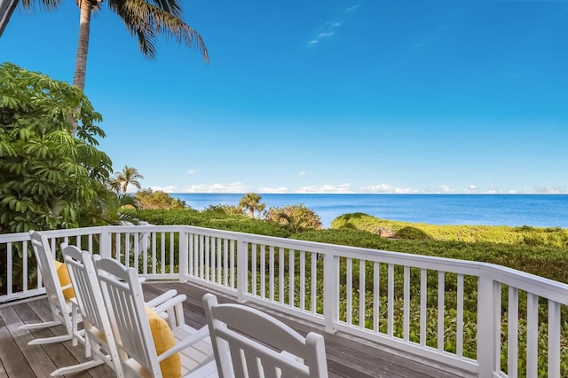 deck featuring a water view