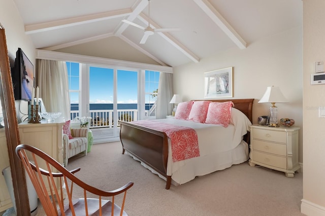 bedroom featuring a water view, access to outside, lofted ceiling with beams, and light colored carpet