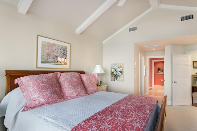 bedroom with carpet floors, high vaulted ceiling, beamed ceiling, and connected bathroom