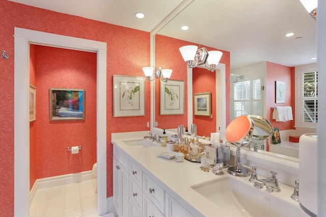 bathroom with toilet, a shower with shower door, a notable chandelier, tile patterned floors, and vanity