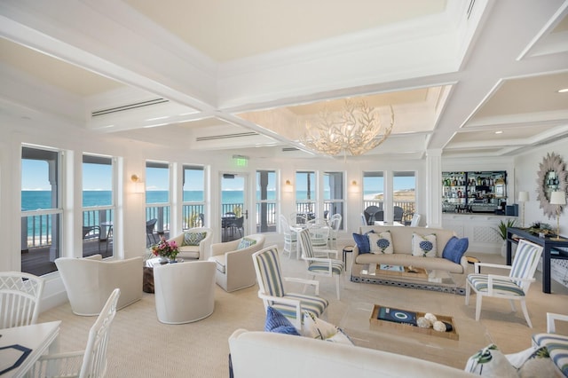 sunroom / solarium with a water view, a wealth of natural light, and coffered ceiling