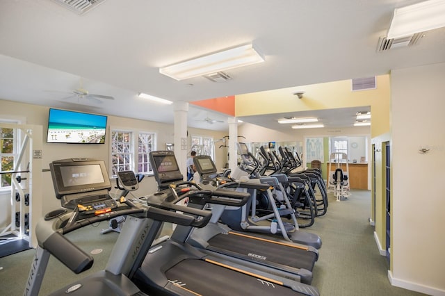 workout area with ornate columns and ceiling fan