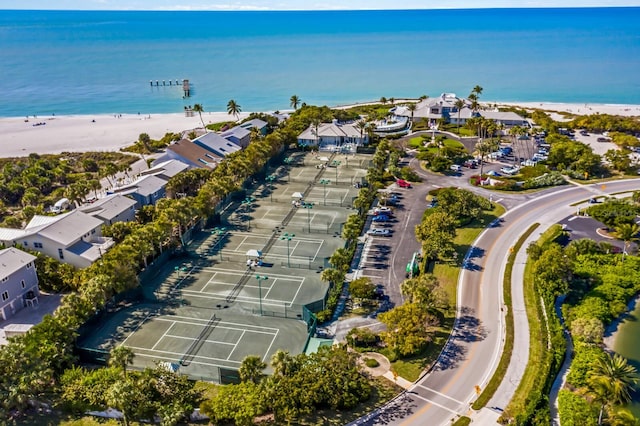 aerial view with a water view and a view of the beach