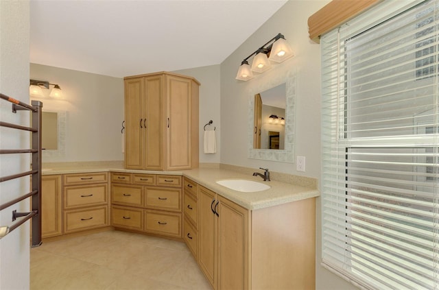 bathroom featuring tile patterned floors and vanity