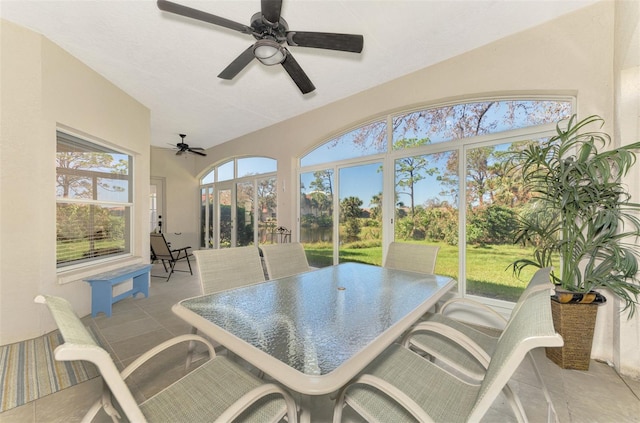 sunroom / solarium with ceiling fan