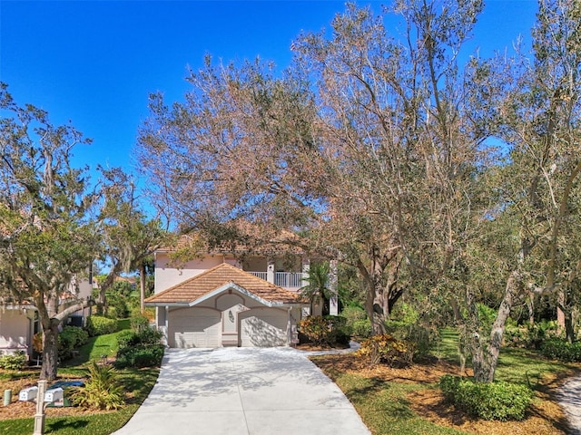 view of front of home with a garage