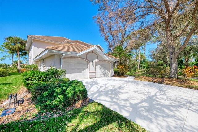 view of front of property with a garage