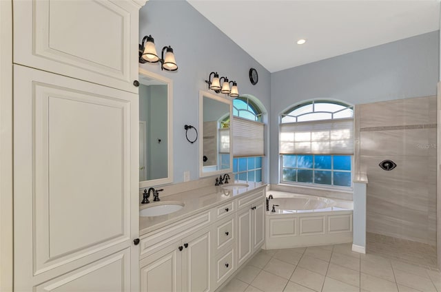 bathroom with vanity, tile patterned floors, and independent shower and bath