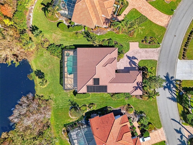 drone / aerial view with a water view