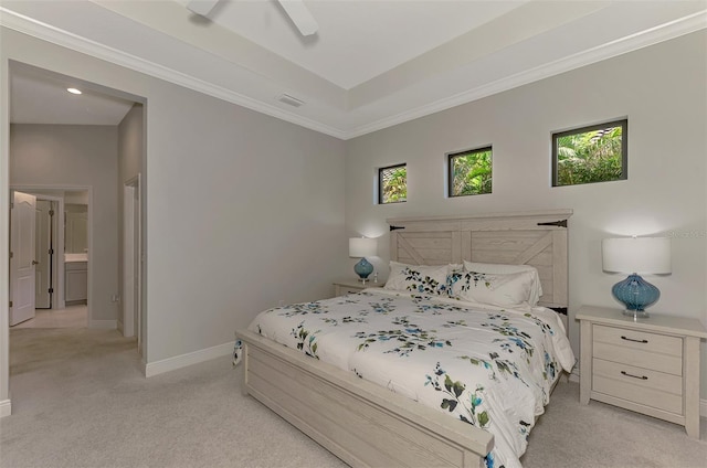 carpeted bedroom featuring crown molding and ceiling fan