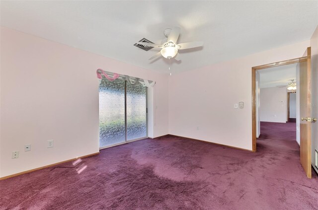 carpeted empty room with ceiling fan