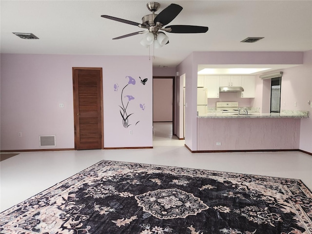 living room with ceiling fan