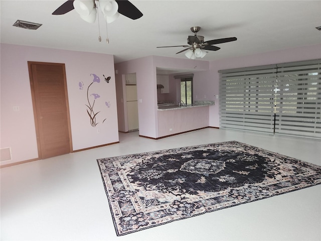 interior space featuring ceiling fan