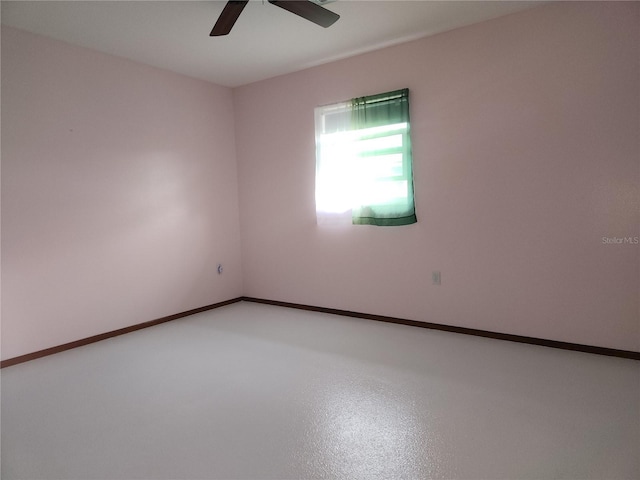 empty room featuring ceiling fan