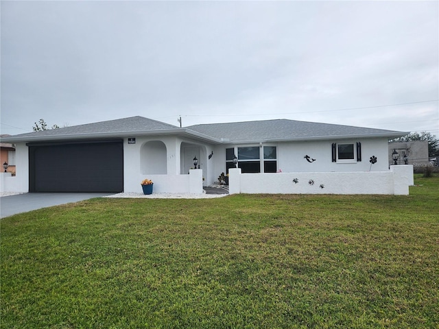 ranch-style house featuring a garage, stucco siding, concrete driveway, and a front yard