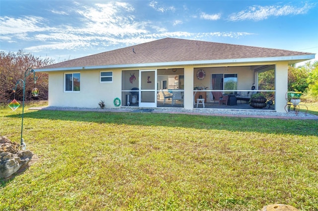 back of house with a yard and a patio area