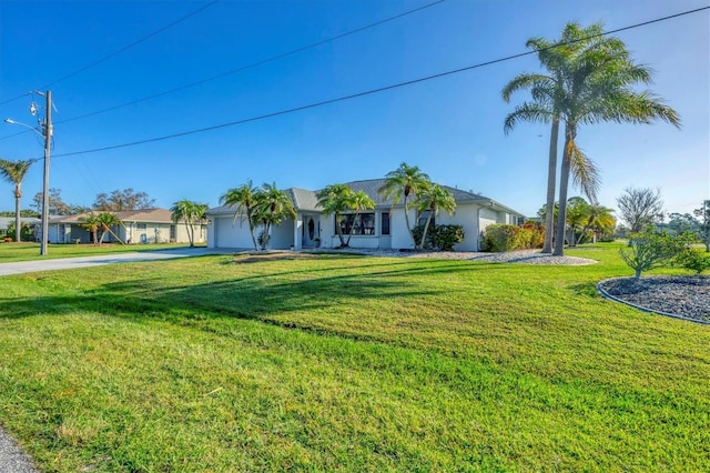 ranch-style house with a front lawn and a garage